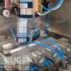 各種松散物品打包成型紙殼紙箱的臥式包裝機